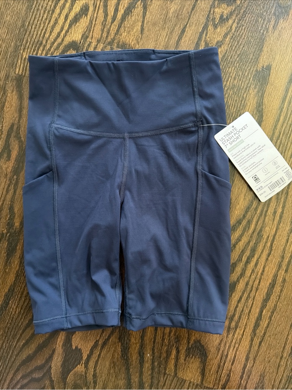 NWT ATHLETA WOMENS NAVY ULTIMATE STASH POCKET 7" SHORTS YOGA BIKE HIGH WAIST XXS